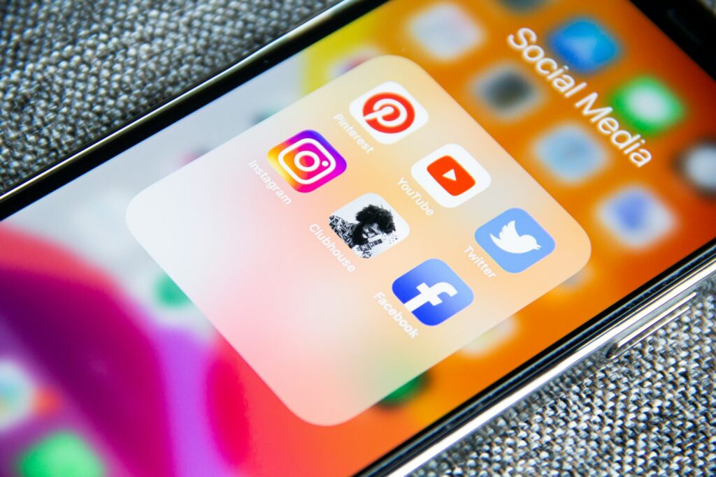 Social media marketing icons on a smartphone screen