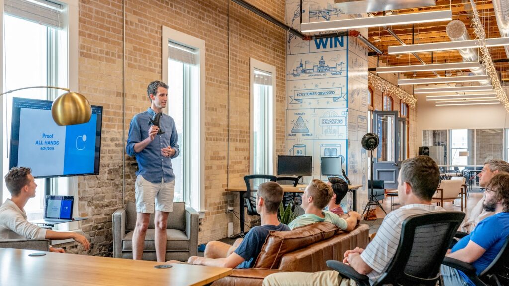 Startup team brainstorming ideas at a whiteboard